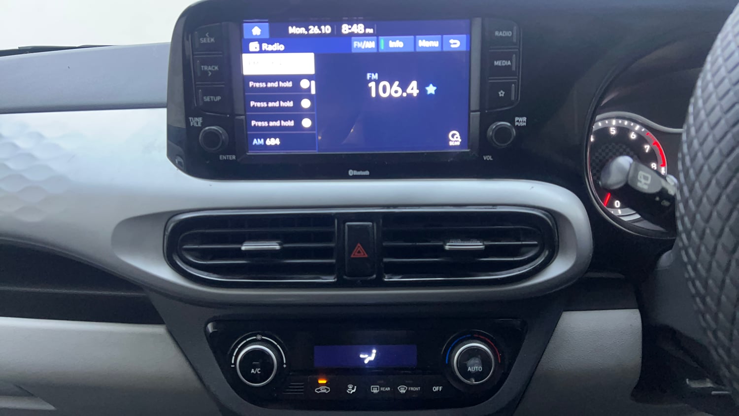Used 2022 Hyundai Grand i10 Nios Asta 1.2 Kappa VTVT Petrol Manual interior MUSIC SYSTEM & AC CONTROL VIEW