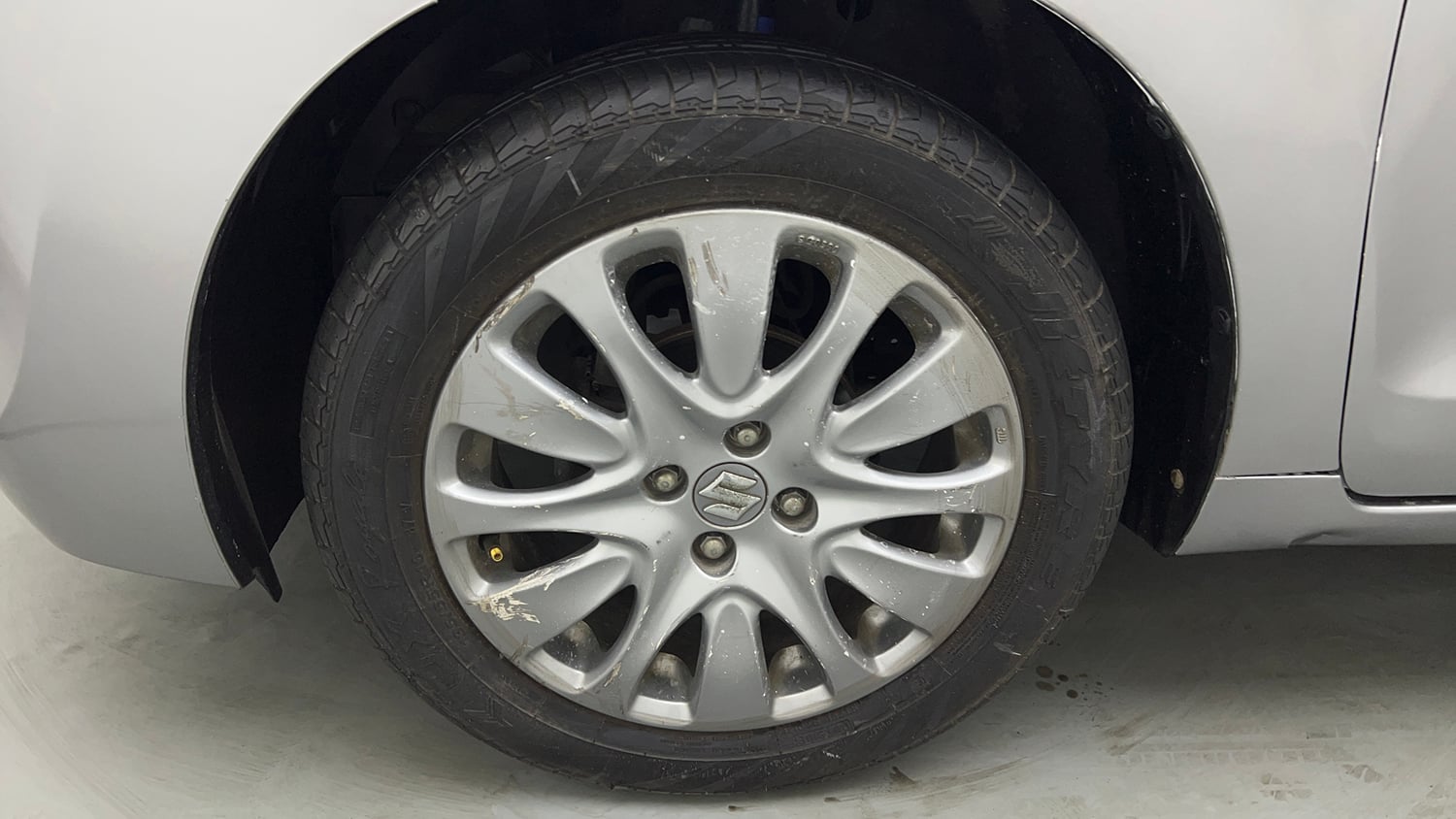 Used 2016 Maruti Suzuki Baleno Zeta 1.2 AT Petrol Automatic tyres LEFT FRONT TYRE RIM VIEW