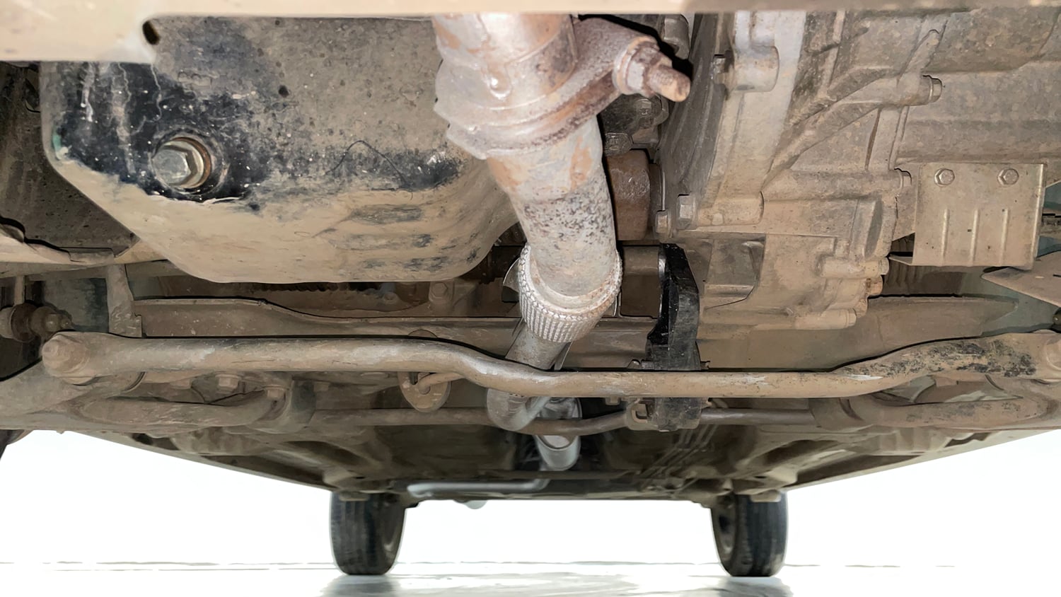 Used 2019 Tata Tigor Revotron XZA+ Petrol Automatic extra FRONT LEFT UNDERBODY VIEW
