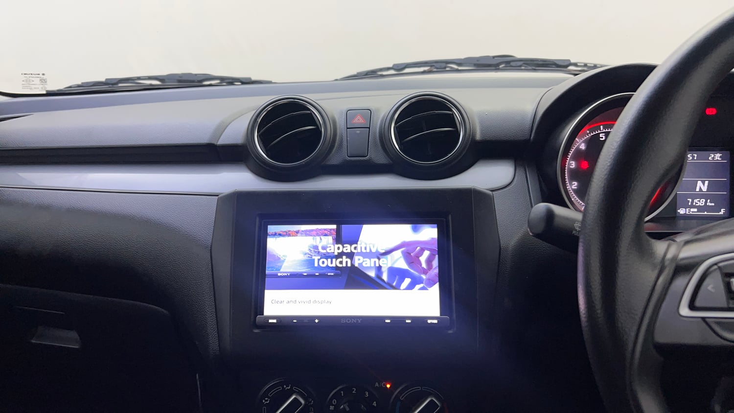 Used 2019 Maruti Suzuki Swift VXi AMT Petrol Automatic top_features Integrated (in-dash) music system