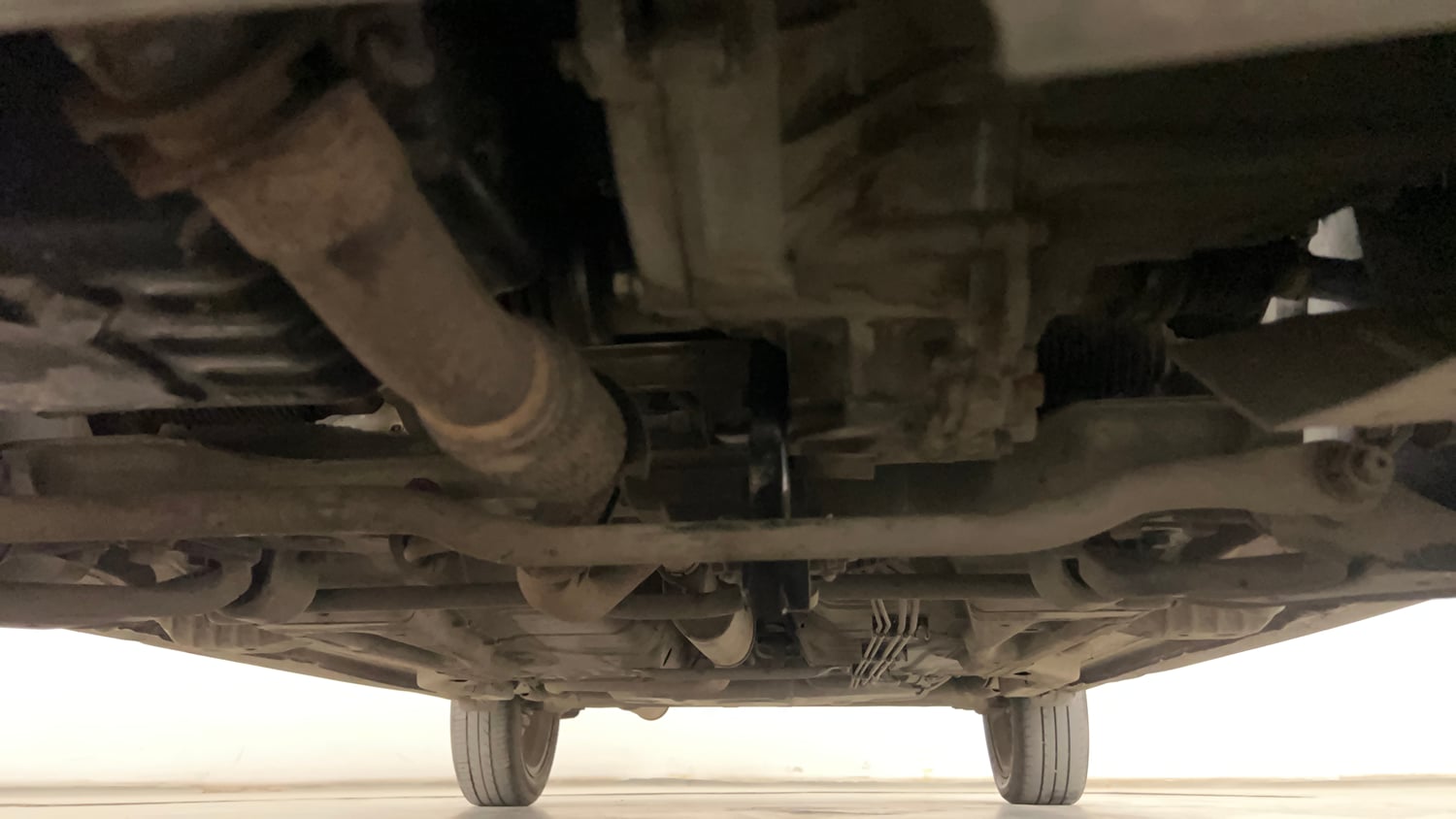 Used 2018 Tata Tigor Revotron XZ (O) Petrol Manual extra FRONT LEFT UNDERBODY VIEW
