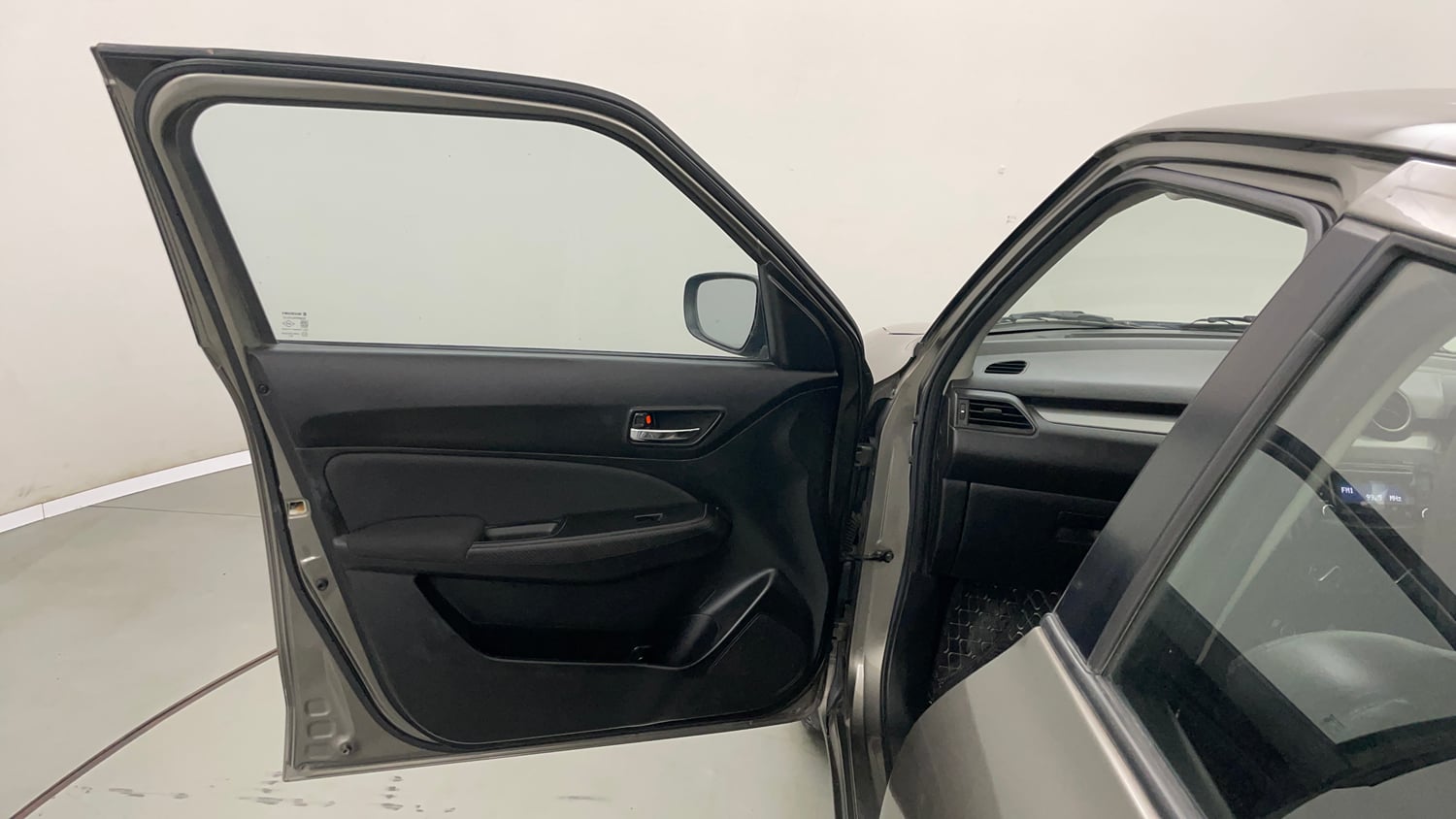 Used 2020 Maruti Suzuki Swift VXi Petrol Manual interior LEFT FRONT DOOR OPEN VIEW