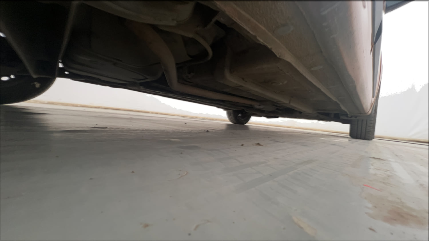 Used 2015 Hyundai Grand i10 Sportz 1.2 Kappa VTVT Petrol Manual extra REAR RIGHT UNDERBODY VIEW
