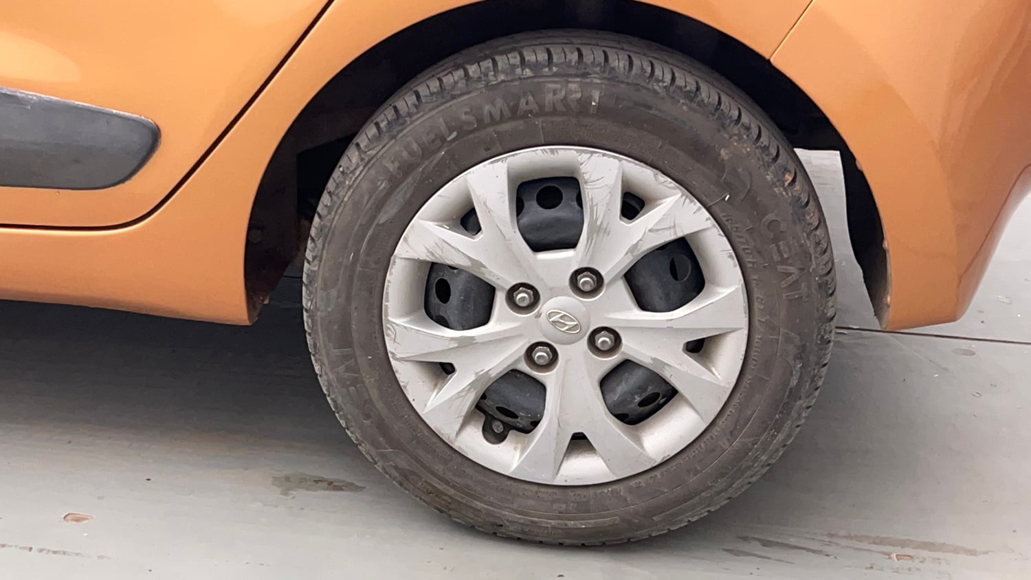Used 2015 Hyundai Grand i10 Sportz 1.2 Kappa VTVT Petrol Manual tyres LEFT REAR TYRE RIM VIEW