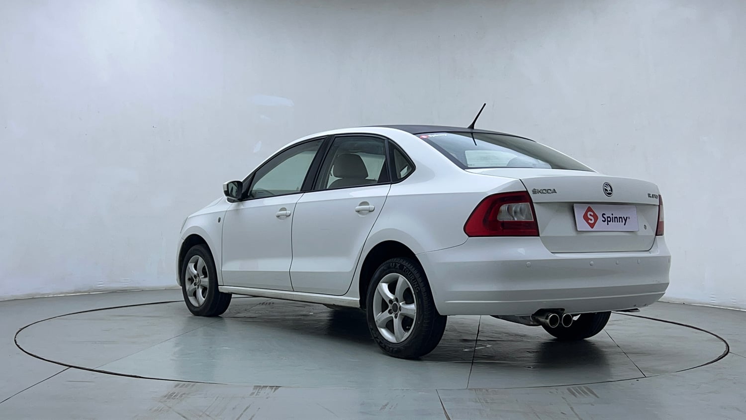 Used 2014 Skoda Rapid 1.6 MPI Elegance Petrol Manual exterior LEFT REAR CORNER VIEW