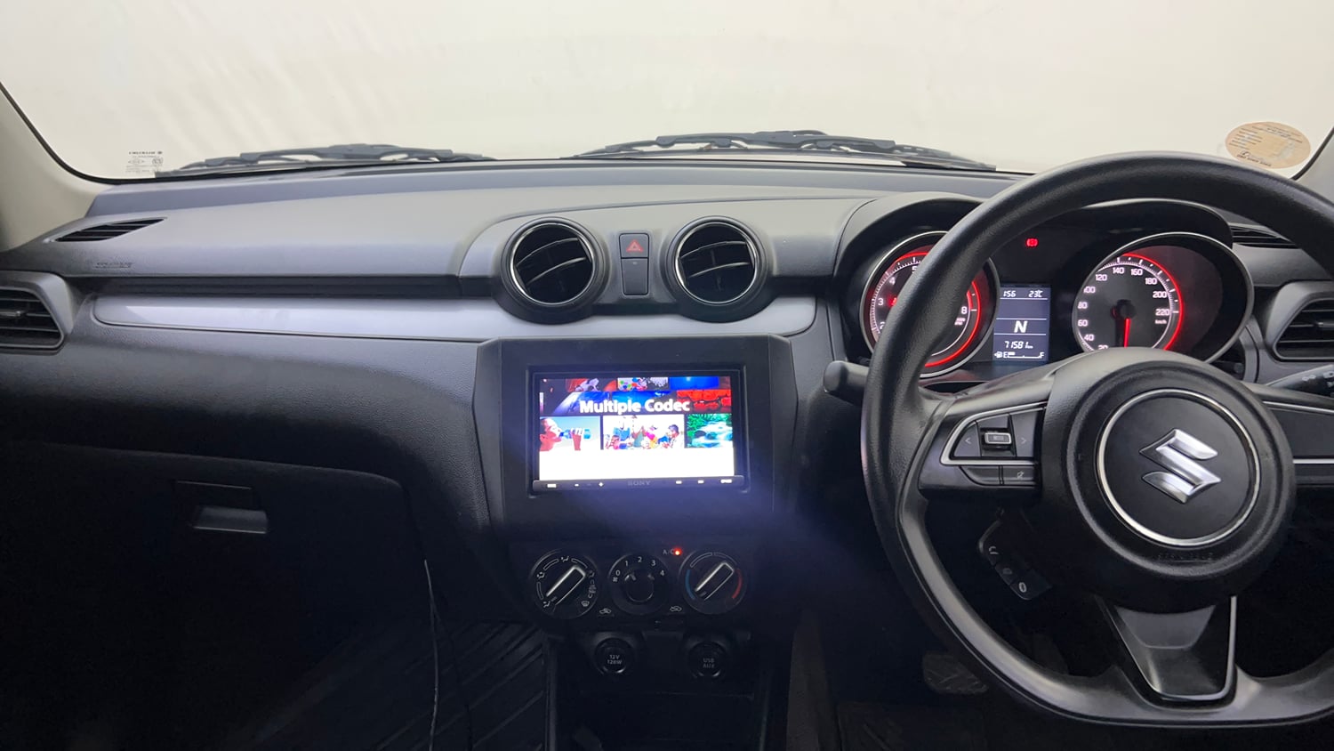 Used 2019 Maruti Suzuki Swift VXi AMT Petrol Automatic interior MUSIC SYSTEM & AC CONTROL VIEW