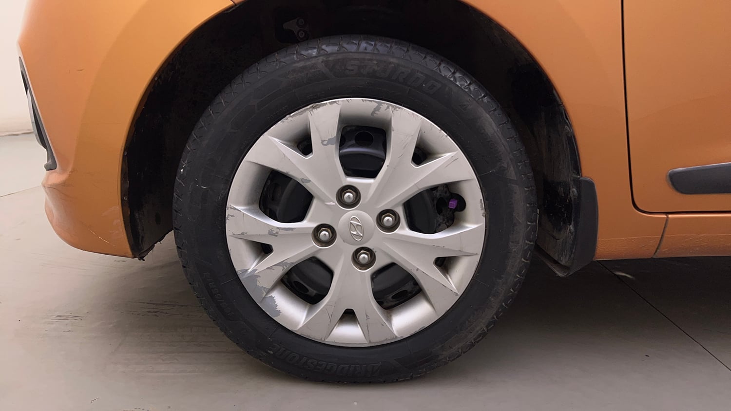 Used 2016 Hyundai Grand i10 Sportz 1.2 Kappa VTVT Petrol Manual tyres LEFT FRONT TYRE RIM VIEW