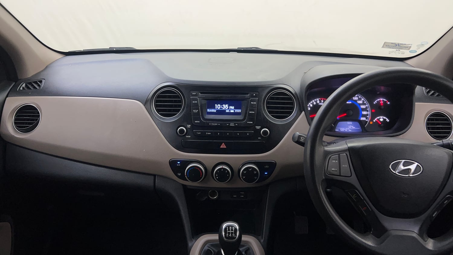Used 2016 Hyundai Grand i10 Sportz 1.2 Kappa VTVT Petrol Manual interior MUSIC SYSTEM & AC CONTROL VIEW