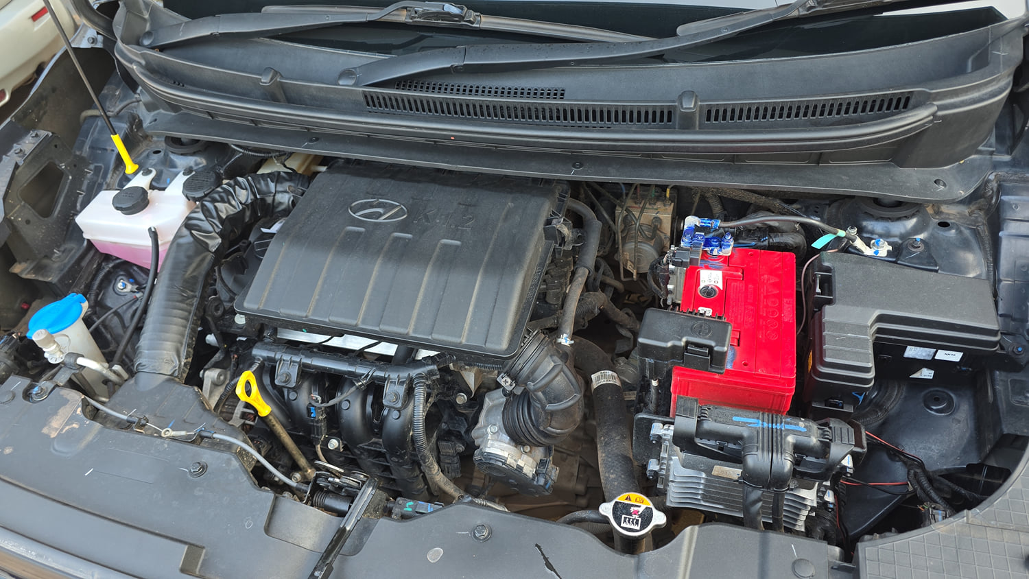 Used 2023 Hyundai Exter SX (O) Connect 1.2 AMT Petrol Automatic engine ENGINE LEFT SIDE VIEW