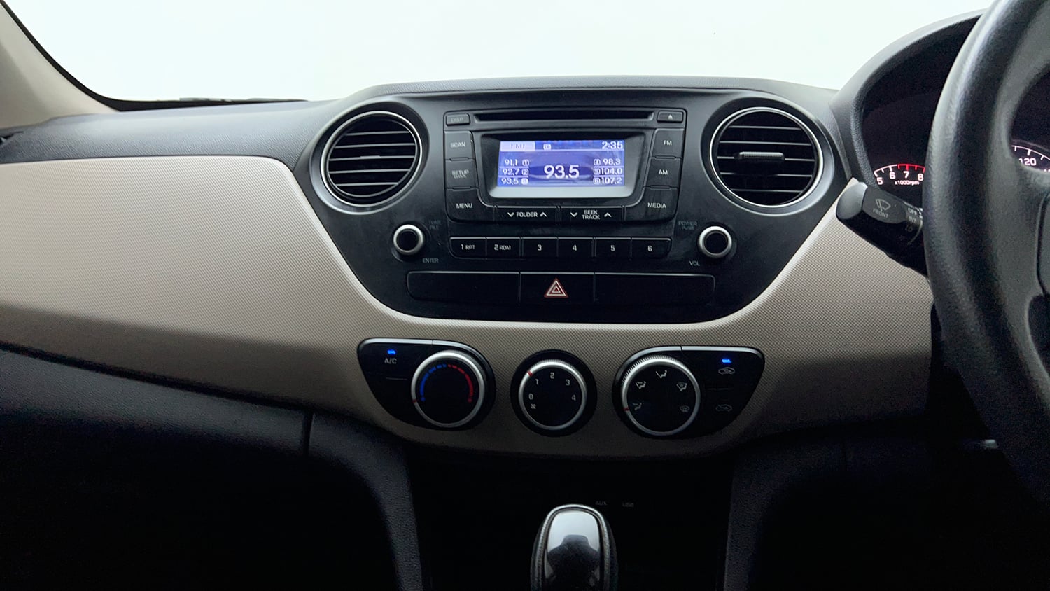 Used 2014 Hyundai Grand i10 Sportz AT 1.2 Kappa VTVT Petrol Automatic interior MUSIC SYSTEM & AC CONTROL VIEW