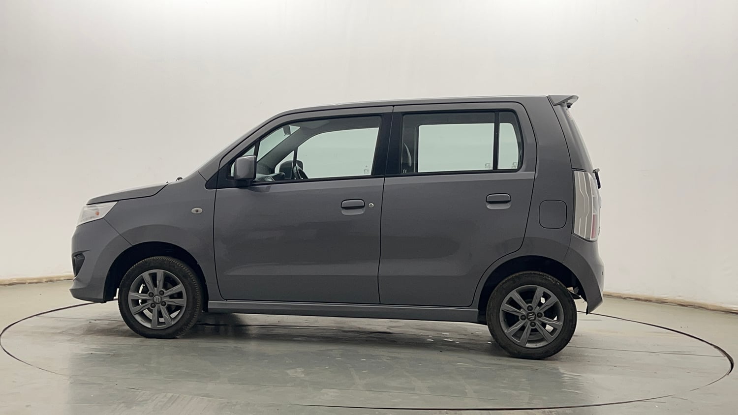 Used 2013 Maruti Suzuki Wagon R Stingray VXi Petrol Manual exterior LEFT SIDE VIEW
