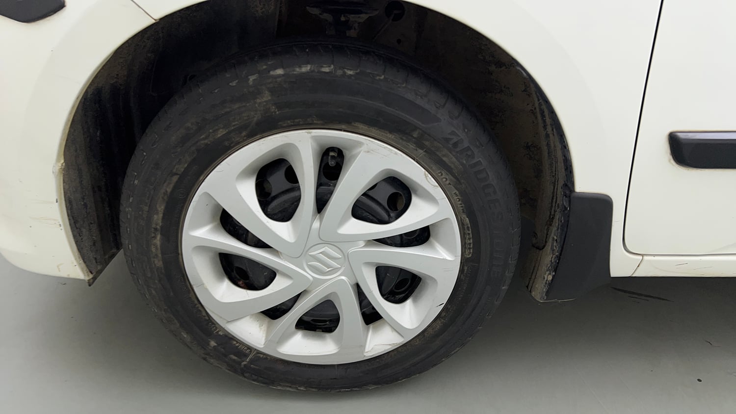 Used 2022 Maruti Suzuki Celerio VXi Petrol Manual tyres LEFT FRONT TYRE RIM VIEW