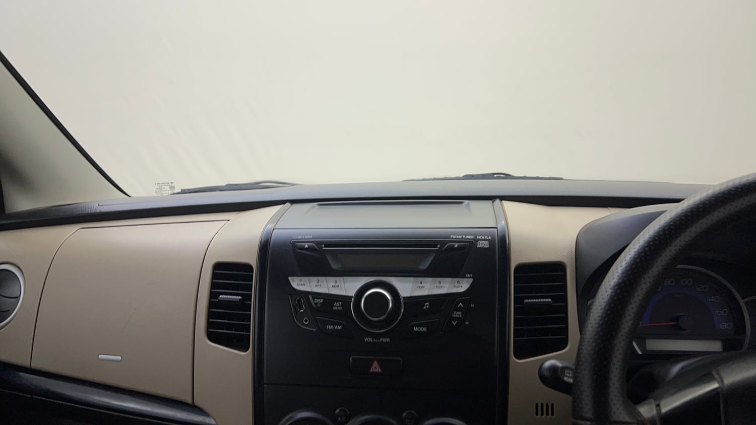 Used 2017 Maruti Suzuki Wagon R VXI Petrol Manual top_features Integrated (in-dash) music system