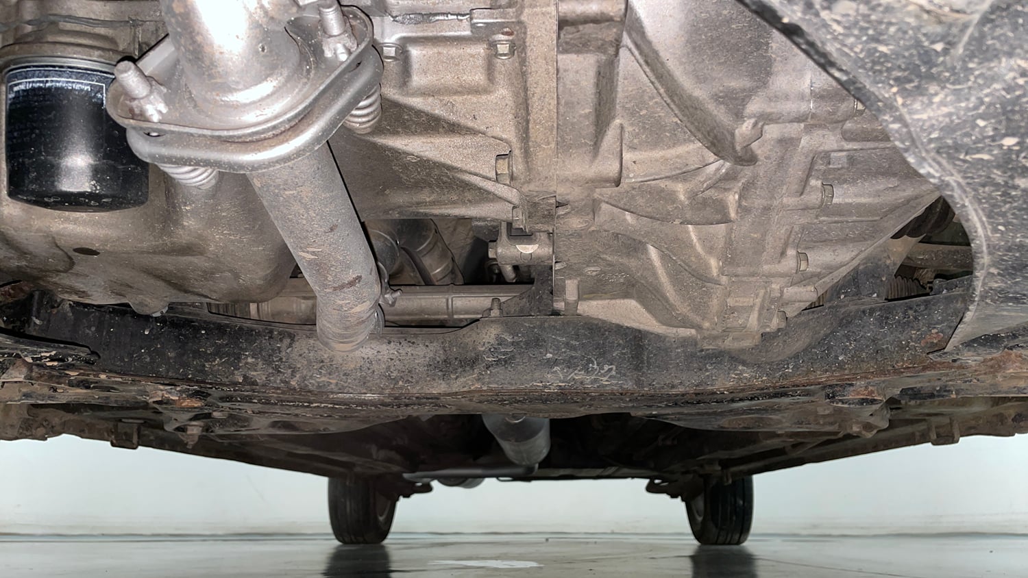 Used 2014 Maruti Suzuki Ertiga ZXi Petrol Manual extra FRONT LEFT UNDERBODY VIEW