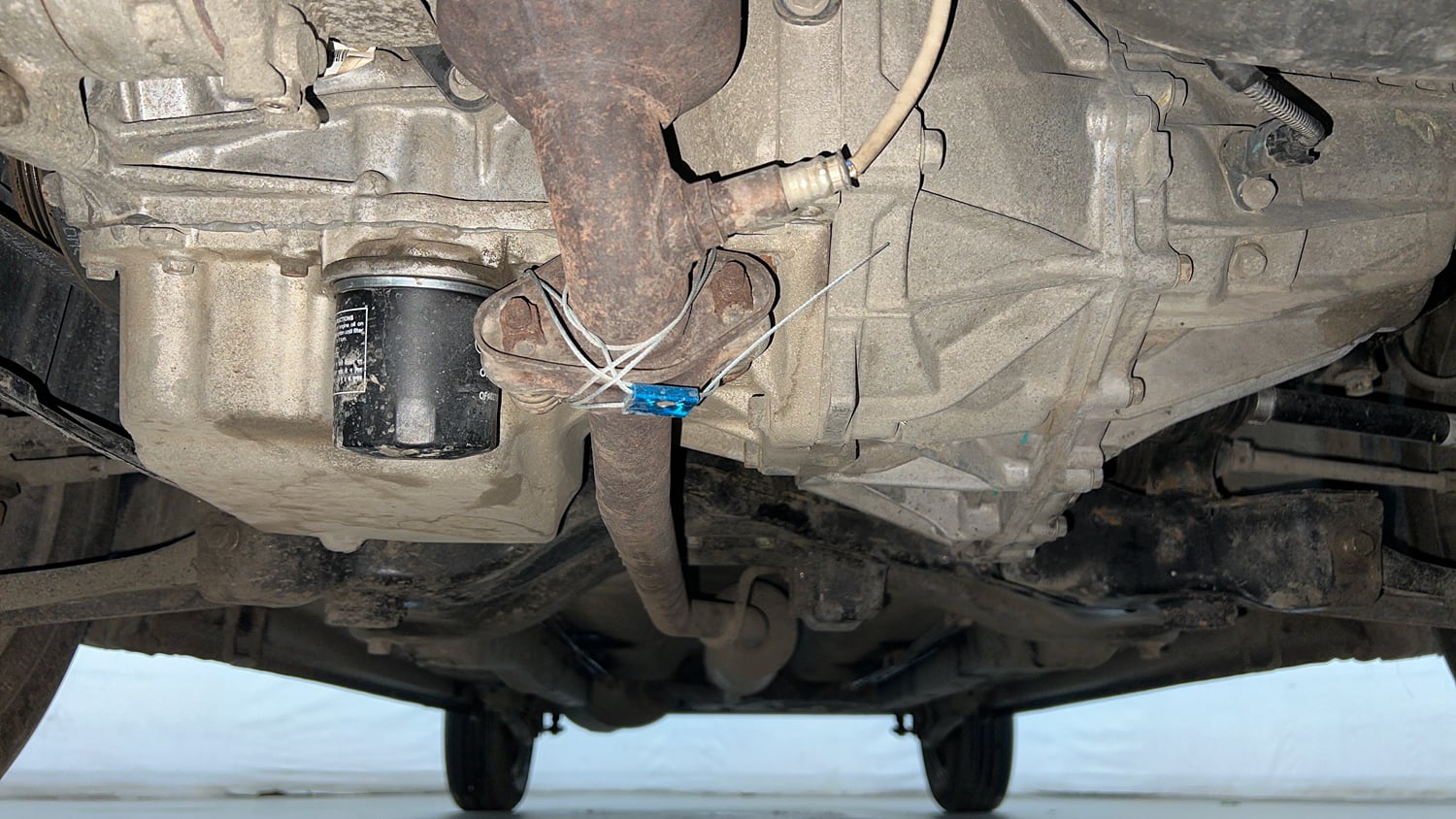 Used 2016 Maruti Suzuki Wagon R 1.0 VXI AMT Petrol Automatic extra FRONT LEFT UNDERBODY VIEW