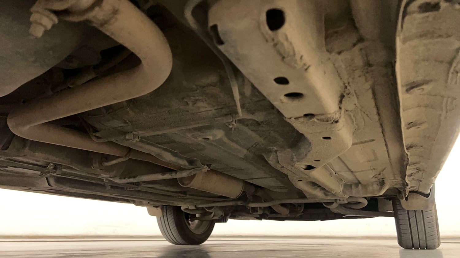 Used 2018 Tata Tigor Revotron XZ (O) Petrol Manual extra REAR RIGHT UNDERBODY VIEW