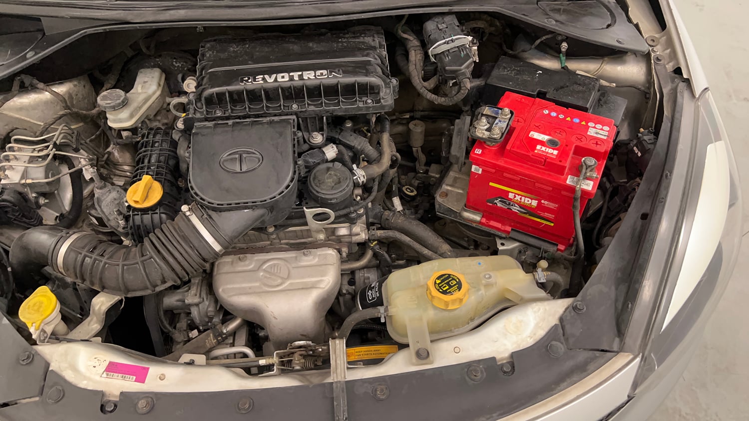 Used 2018 Tata Tigor Revotron XZ (O) Petrol Manual engine ENGINE LEFT SIDE VIEW