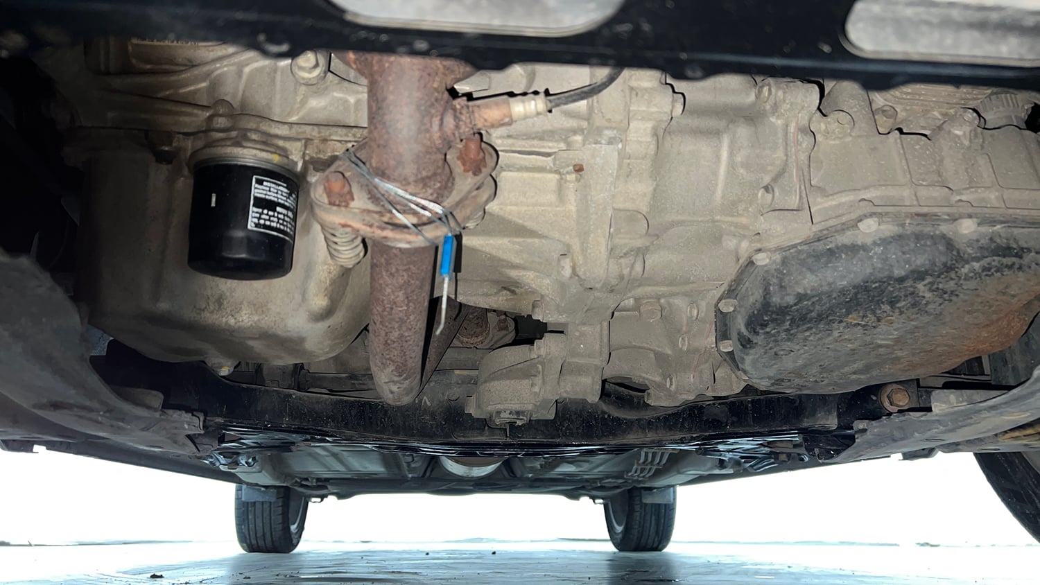 Used 2016 Maruti Suzuki Baleno Zeta 1.2 AT Petrol Automatic extra FRONT LEFT UNDERBODY VIEW