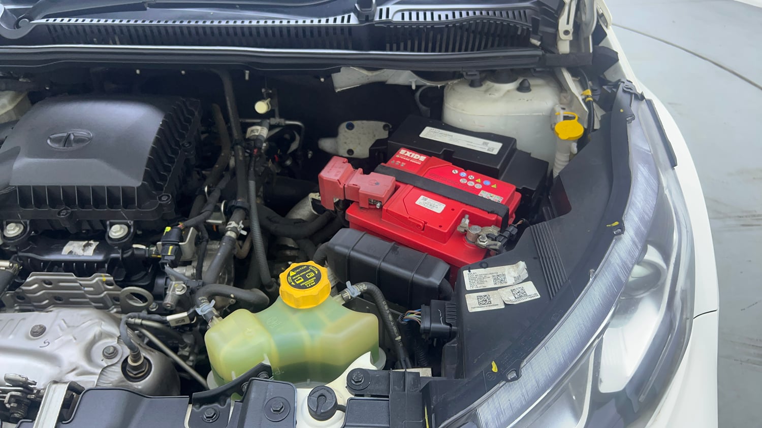 Used 2023 Tata Nexon XZA Plus (S) Petrol Automatic engine ENGINE LEFT SIDE VIEW