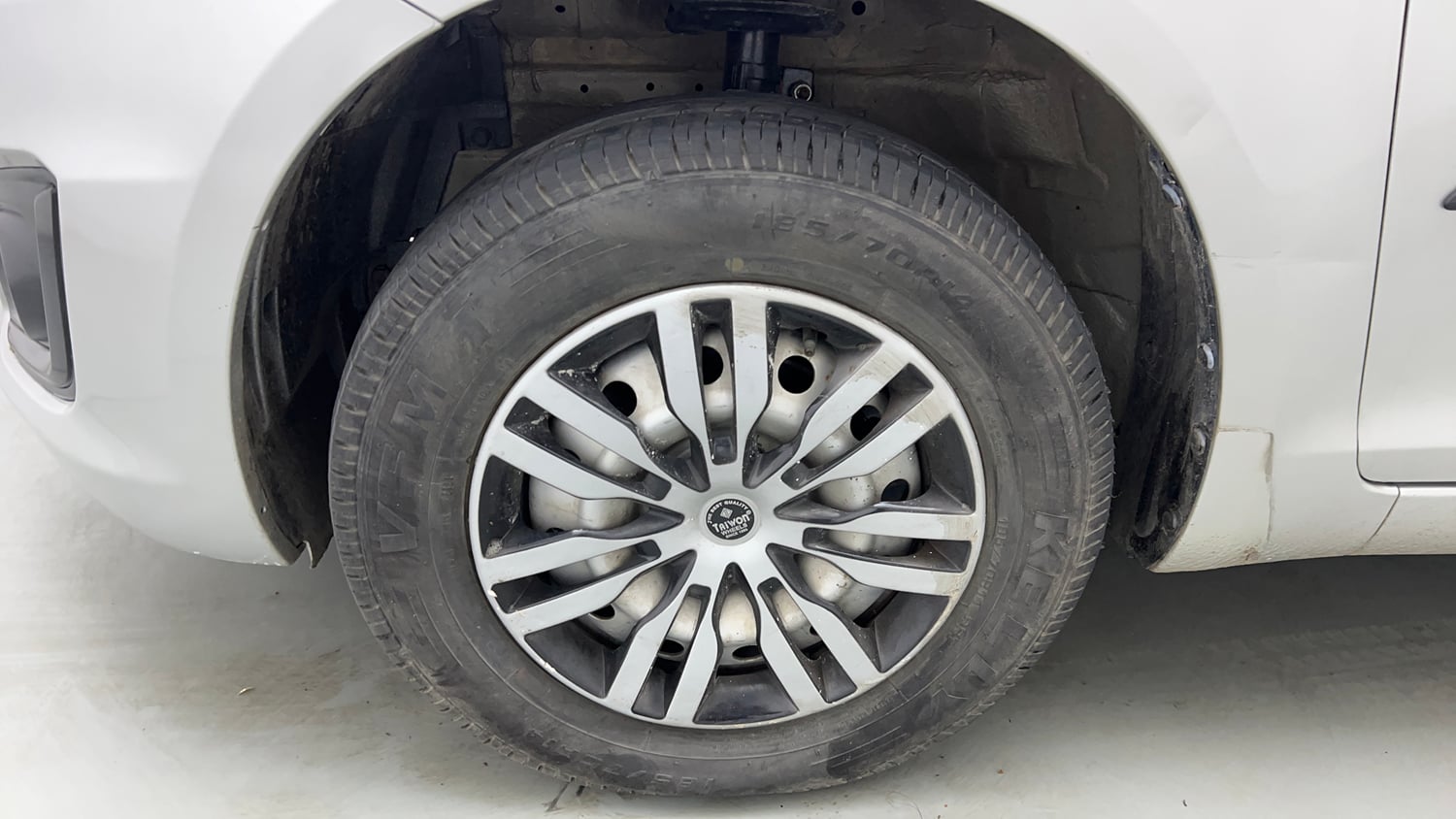 Used 2016 Maruti Suzuki Swift Lxi (O) Petrol Manual tyres LEFT FRONT TYRE RIM VIEW