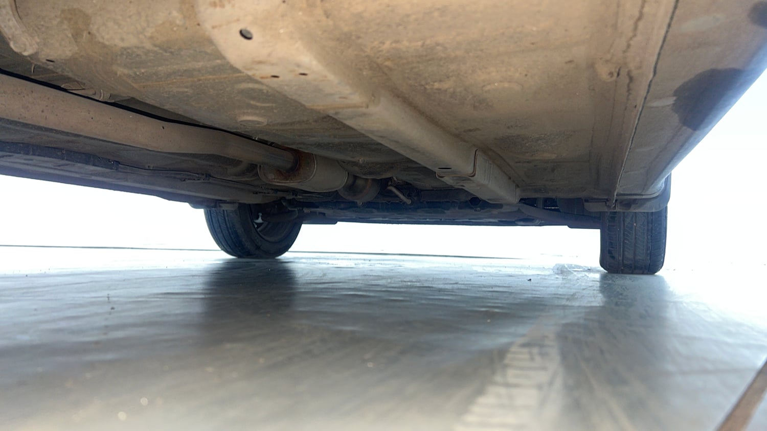 Used 2024 Hyundai Grand i10 Nios Sportz 1.2 Kappa AMT Petrol Automatic extra REAR RIGHT UNDERBODY VIEW