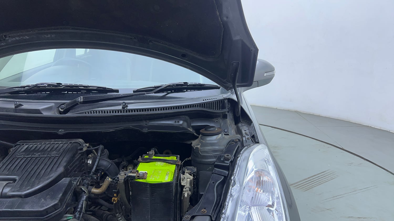 Used 2014 Maruti Suzuki Swift VXi Petrol Manual engine ENGINE LEFT SIDE HINGE & APRON VIEW