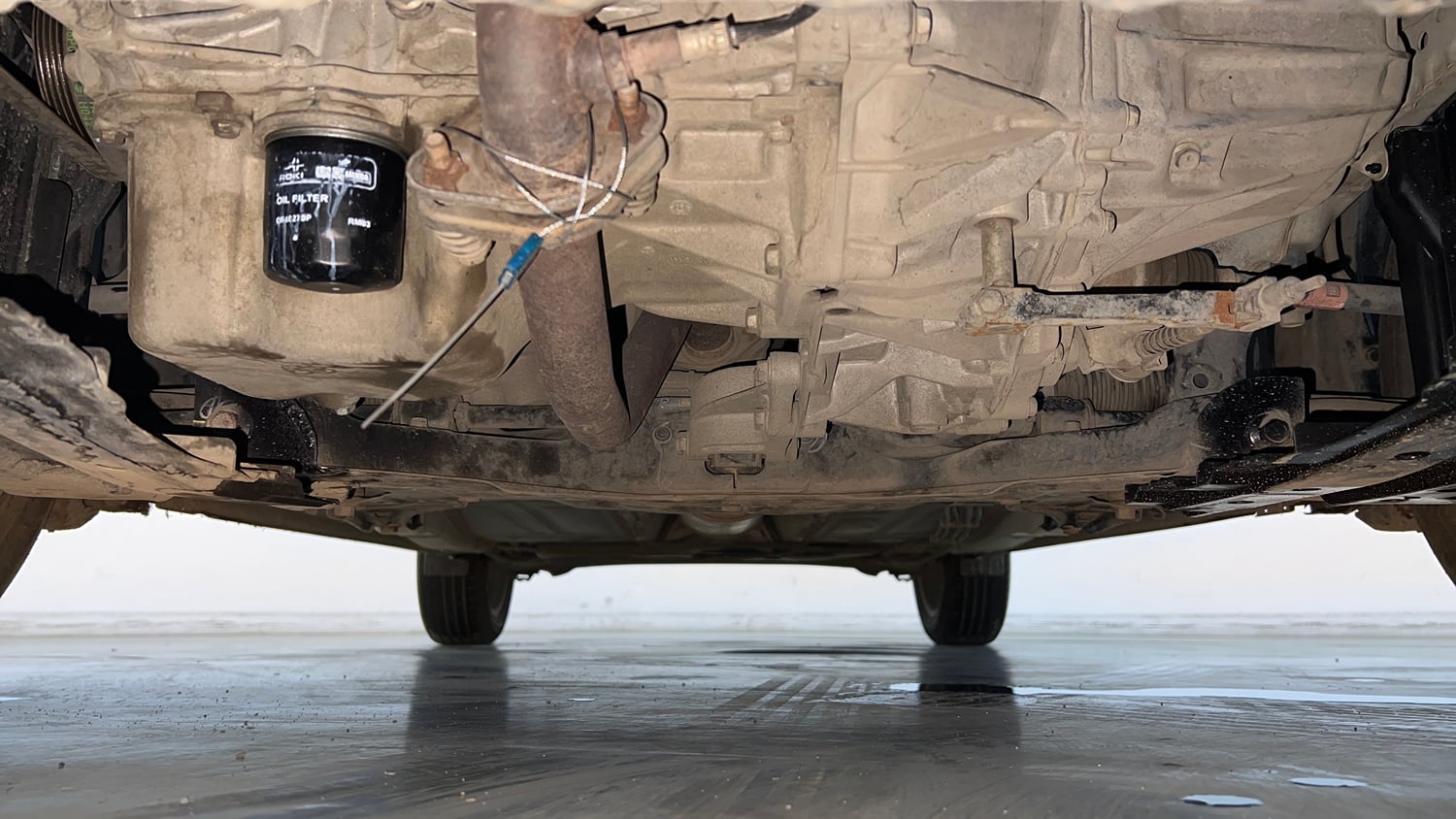 Used 2021 Maruti Suzuki Baleno Zeta Petrol Manual extra FRONT LEFT UNDERBODY VIEW