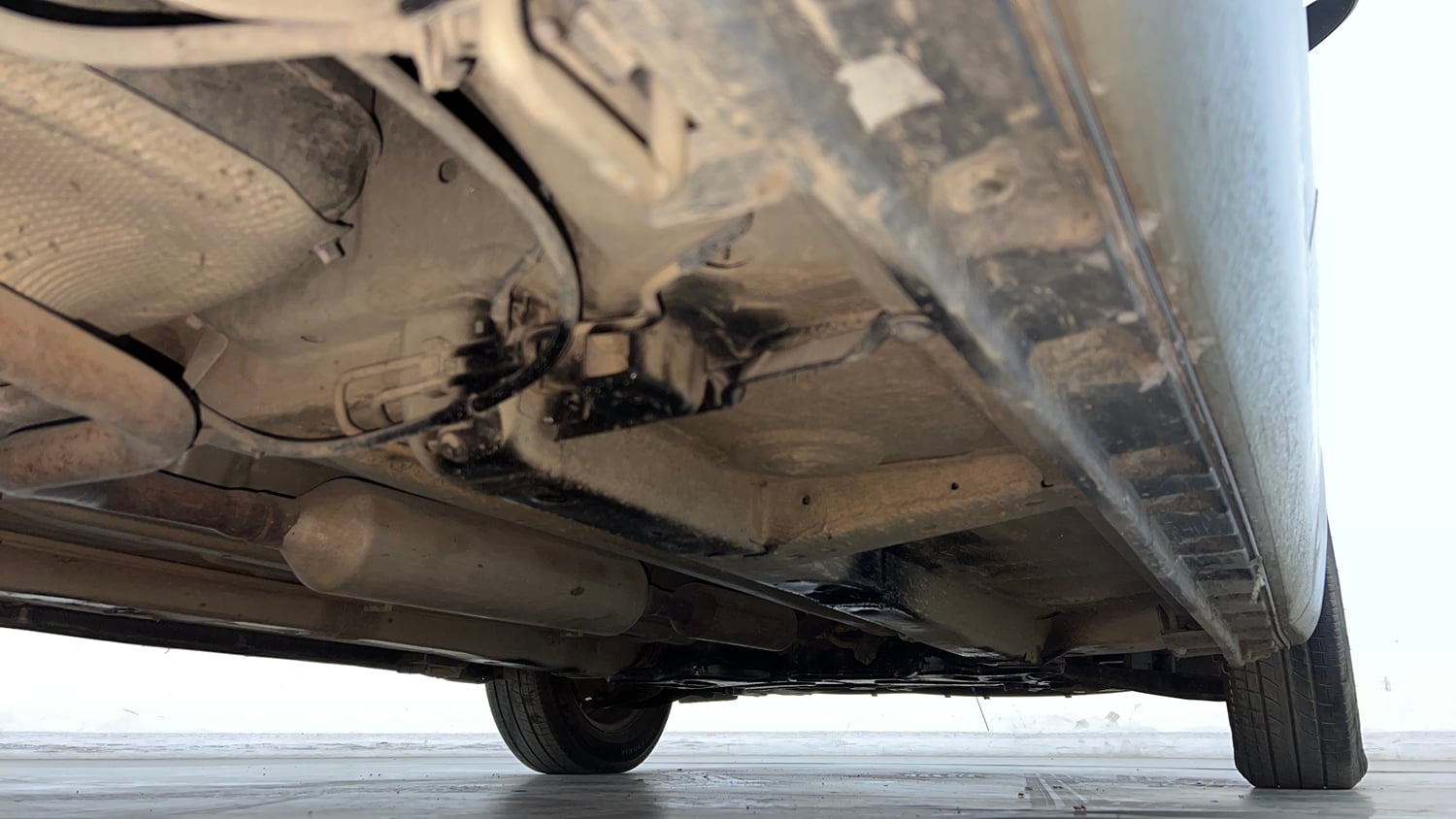 Used 2016 Maruti Suzuki Swift Lxi (O) Petrol Manual extra REAR RIGHT UNDERBODY VIEW