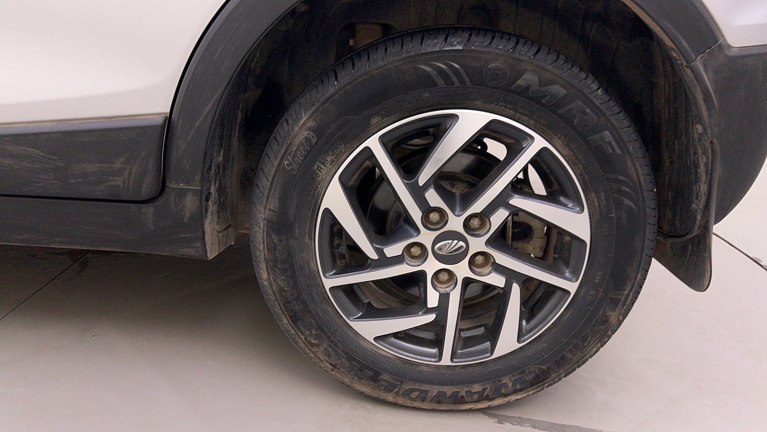 Used 2022 Mahindra XUV 300 W8 (O) 1.2 Petrol Petrol Manual tyres LEFT REAR TYRE RIM VIEW