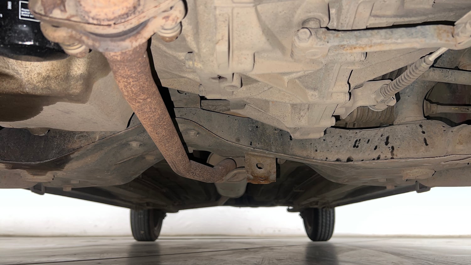 Used 2015 Maruti Suzuki Celerio VXi Petrol Manual extra FRONT LEFT UNDERBODY VIEW