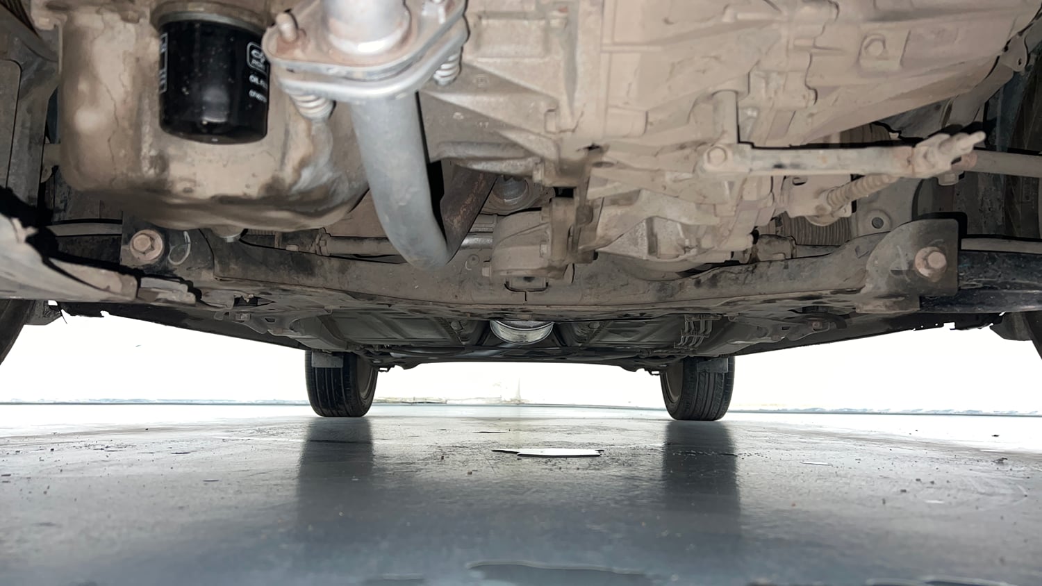 Used 2020 Maruti Suzuki Baleno Zeta Petrol Manual extra FRONT LEFT UNDERBODY VIEW