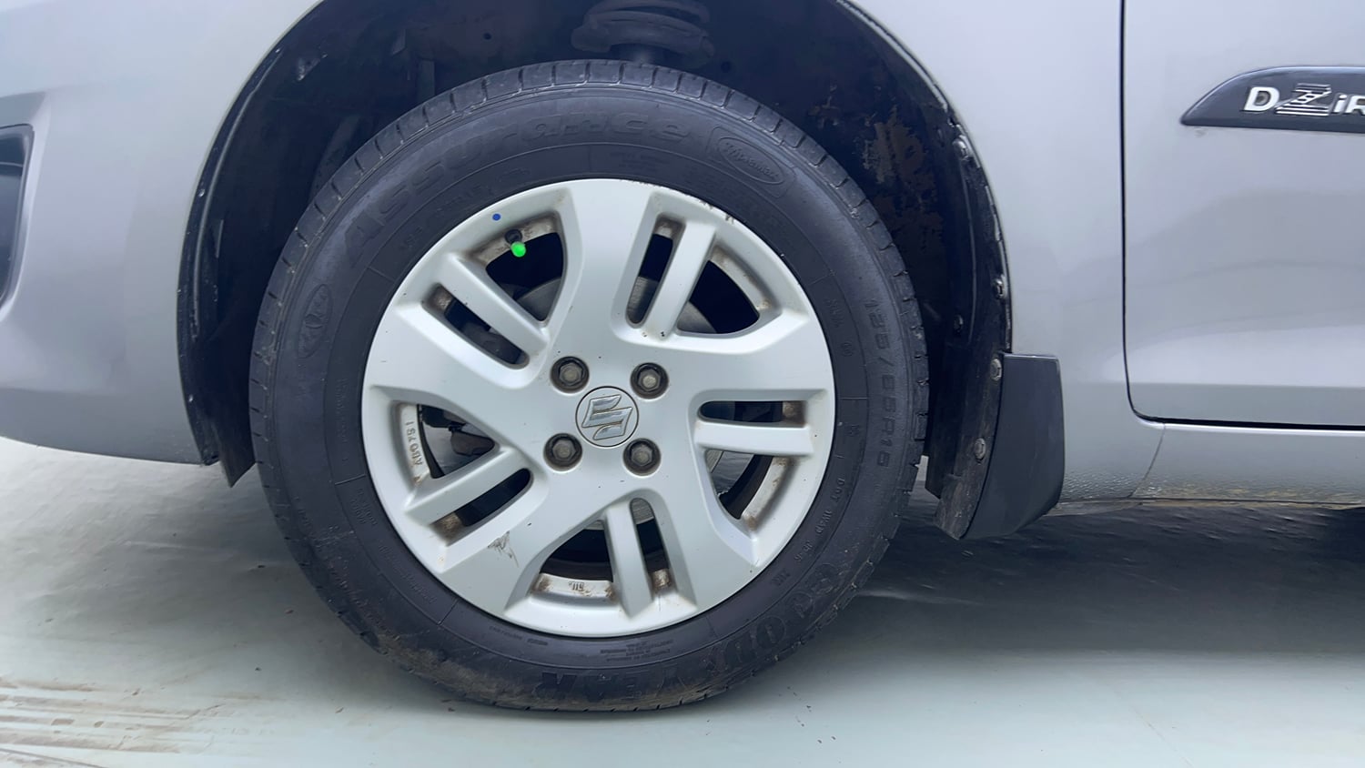 Used 2015 Maruti Suzuki Swift Dzire ZXI Petrol Manual tyres LEFT FRONT TYRE RIM VIEW