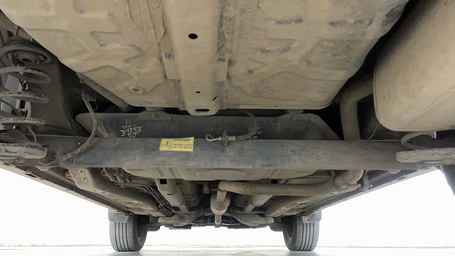 Used 2024 Tata Nexon Creative 1.2 Revotron Petrol 6AMT DT Petrol Automatic extra REAR UNDERBODY VIEW (TAKEN FROM REAR)