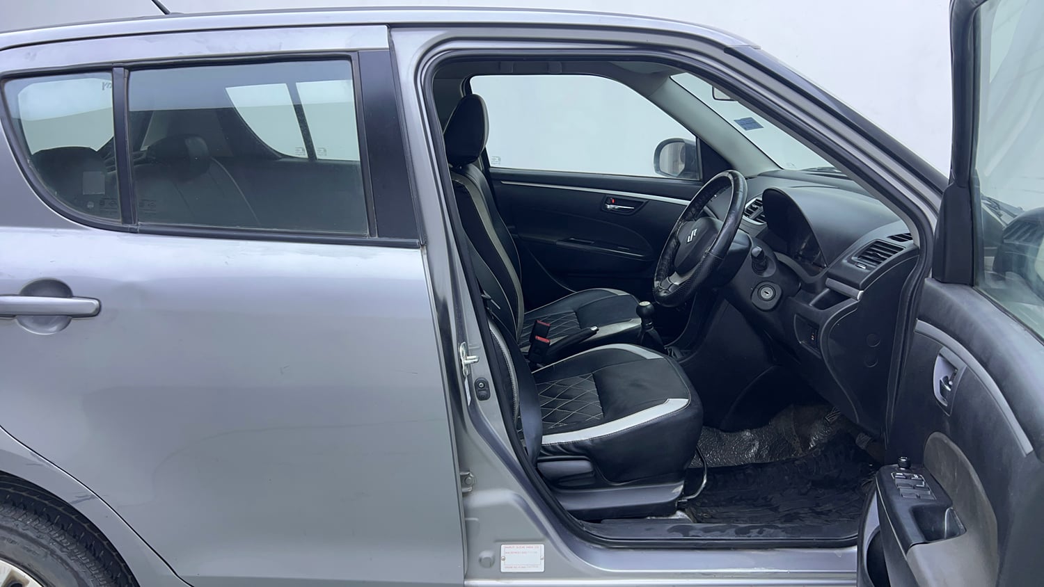 Used 2014 Maruti Suzuki Swift VXi Petrol Manual interior RIGHT SIDE FRONT DOOR CABIN VIEW