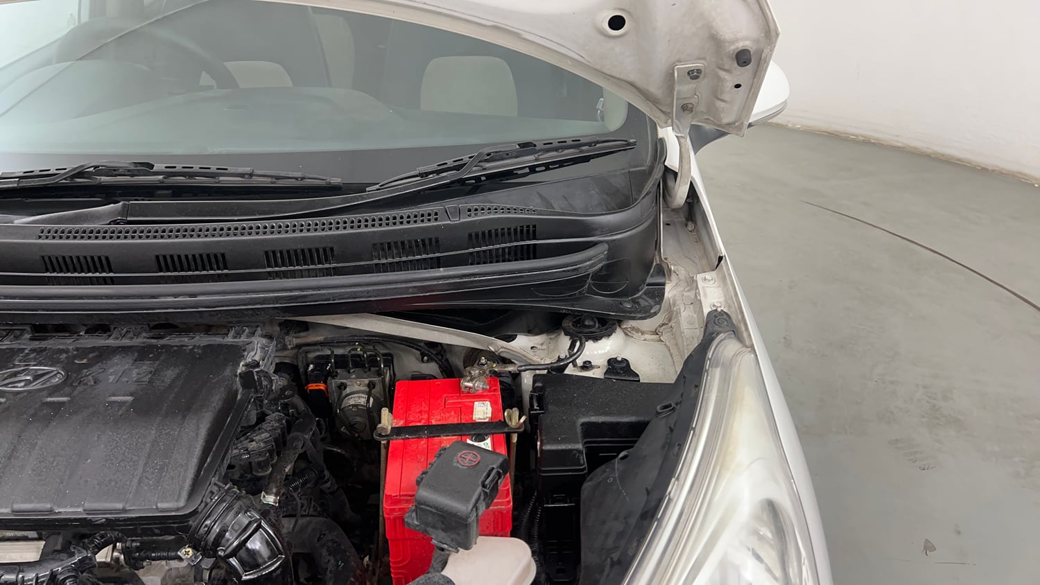 Used 2016 Hyundai Grand i10 Asta 1.2 Kappa VTVT (O) Petrol Manual engine ENGINE LEFT SIDE HINGE & APRON VIEW