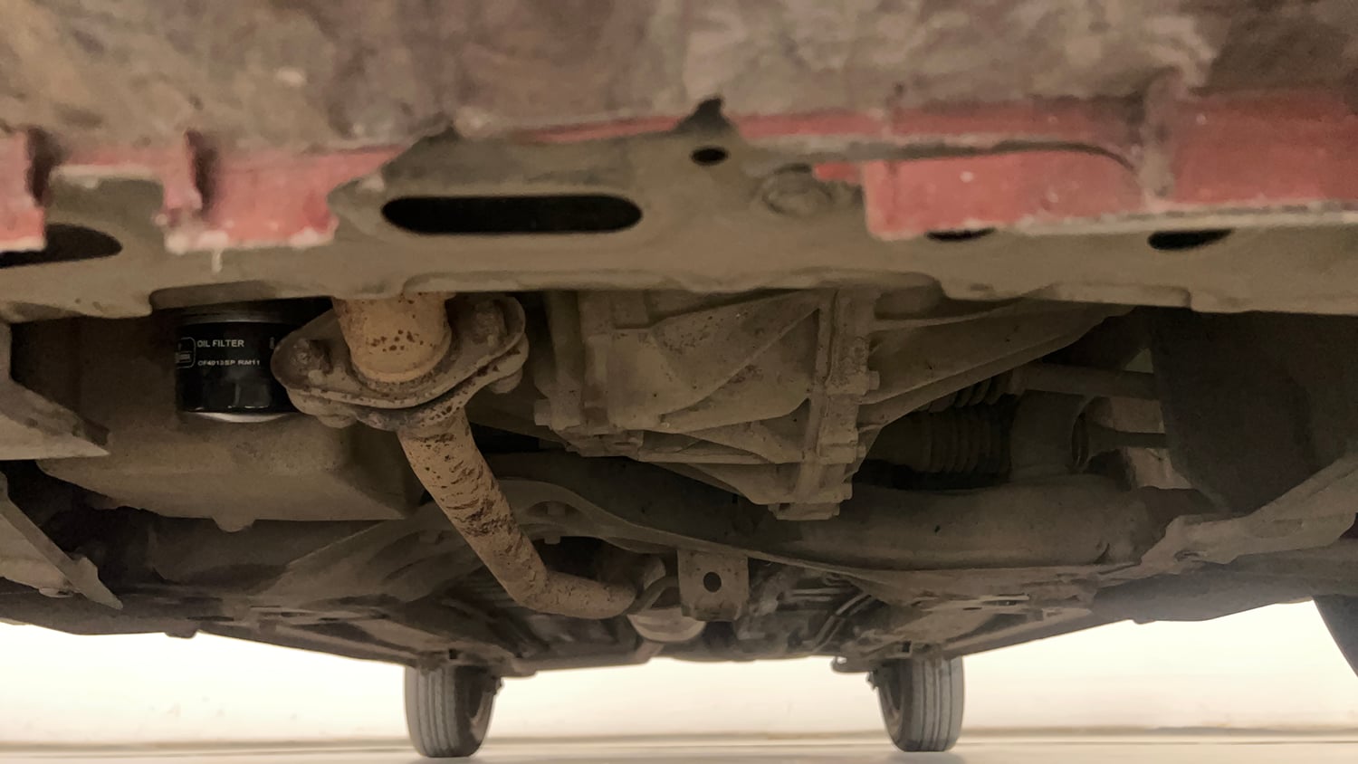 Used 2014 Maruti Suzuki Celerio VXi AMT Petrol Automatic extra FRONT LEFT UNDERBODY VIEW
