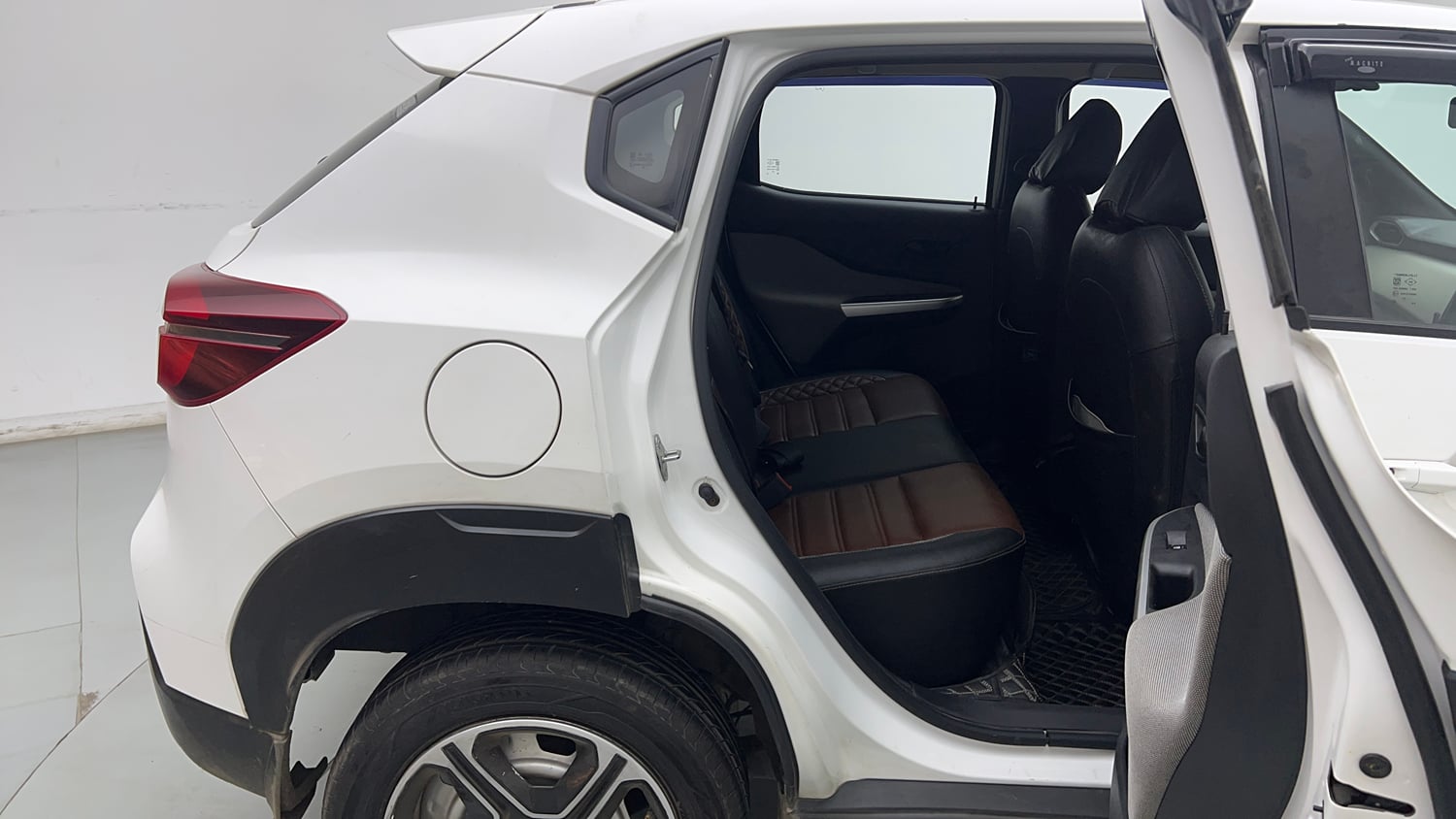 Used 2023 Nissan Magnite XE Petrol Manual interior RIGHT SIDE REAR DOOR CABIN VIEW