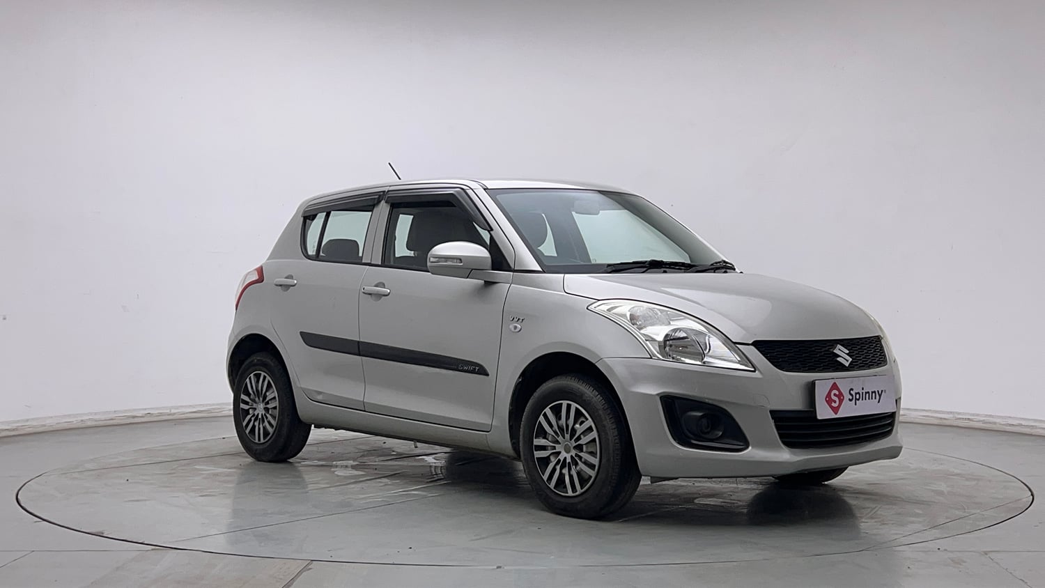 Used 2016 Maruti Suzuki Swift Lxi (O) Petrol Manual exterior RIGHT FRONT CORNER VIEW