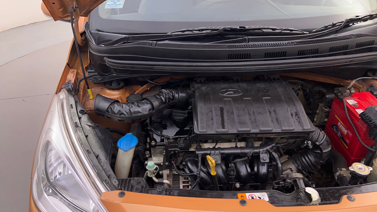 Used 2017 Hyundai Grand i10 Sportz (O) 1.2 Kappa VTVT Petrol Manual engine ENGINE RIGHT SIDE HINGE & APRON VIEW