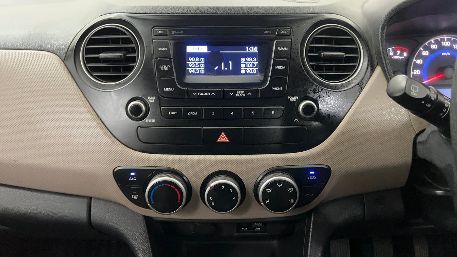 Used 2016 Hyundai Grand i10 Asta 1.2 Kappa VTVT (O) Petrol Manual interior MUSIC SYSTEM & AC CONTROL VIEW