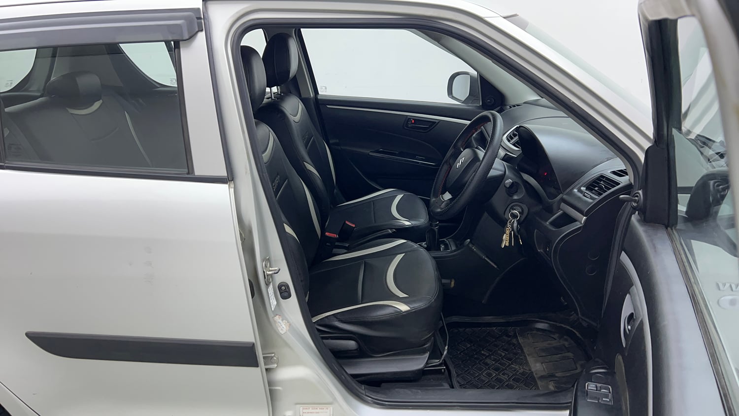 Used 2016 Maruti Suzuki Swift Lxi (O) Petrol Manual interior RIGHT SIDE FRONT DOOR CABIN VIEW