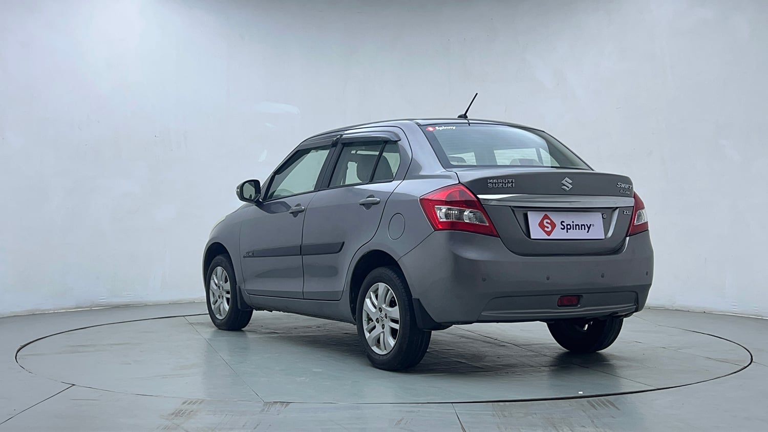 Used 2015 Maruti Suzuki Swift Dzire ZXI Petrol Manual exterior LEFT REAR CORNER VIEW