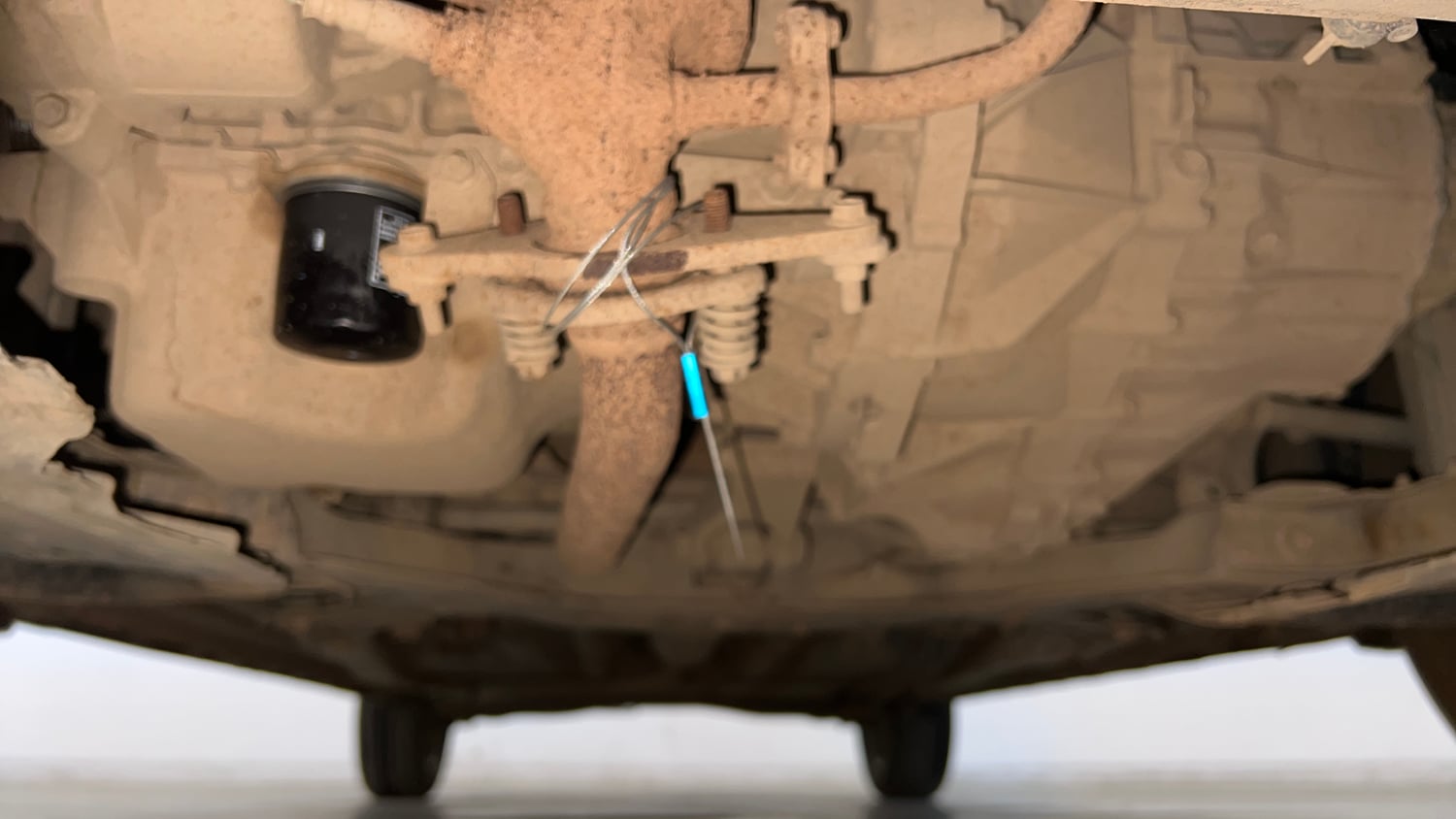 Used 2023 Maruti Suzuki XL6 Zeta MT Petrol Petrol Manual extra FRONT LEFT UNDERBODY VIEW