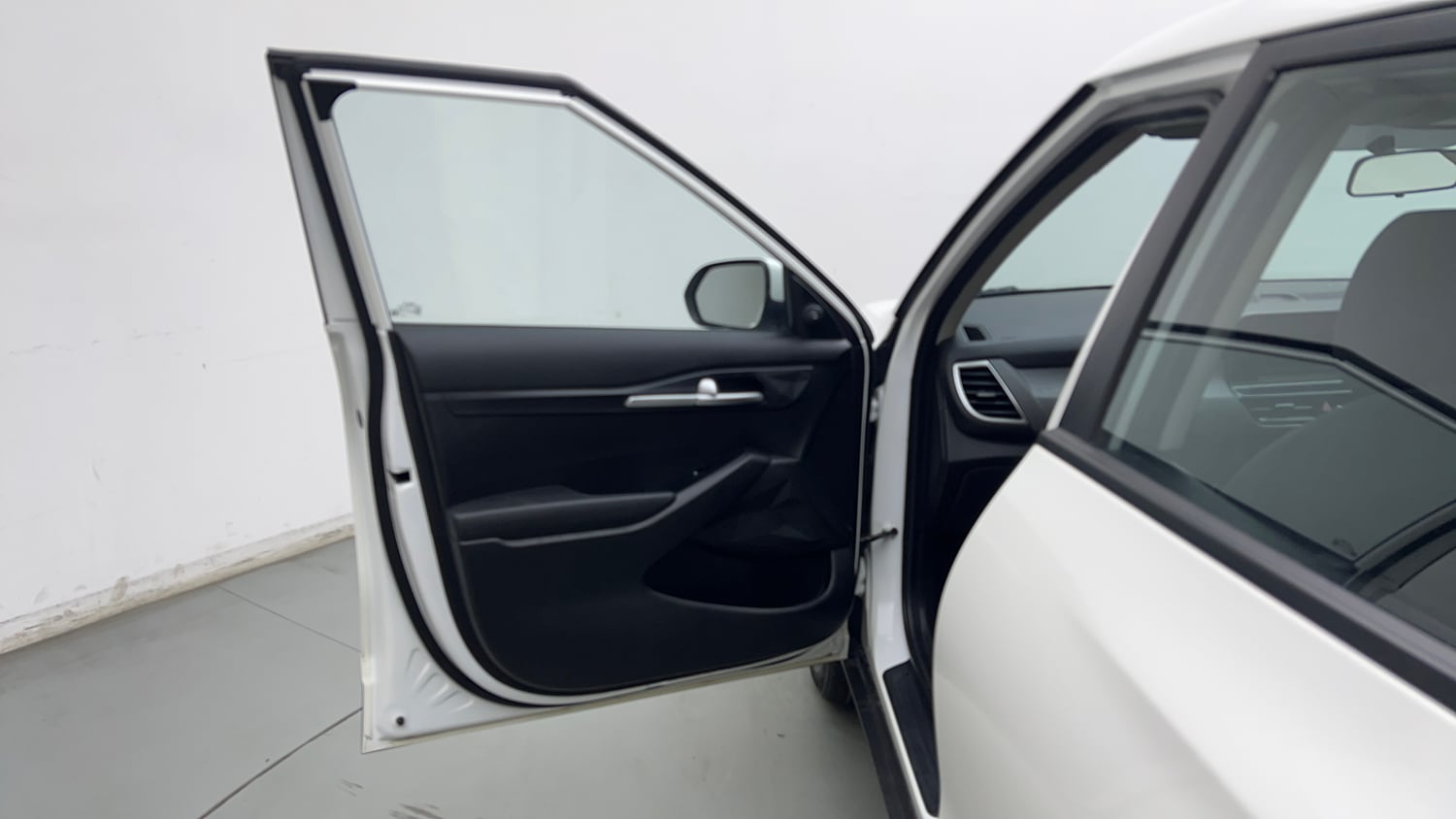 Used 2024 Kia Seltos HTE 1.5 Diesel MT Diesel Manual interior LEFT FRONT DOOR OPEN VIEW