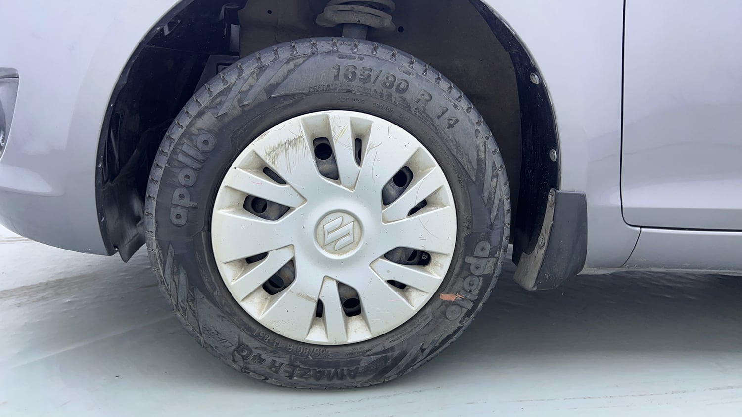 Used 2014 Maruti Suzuki Swift VXi Petrol Manual tyres LEFT FRONT TYRE RIM VIEW