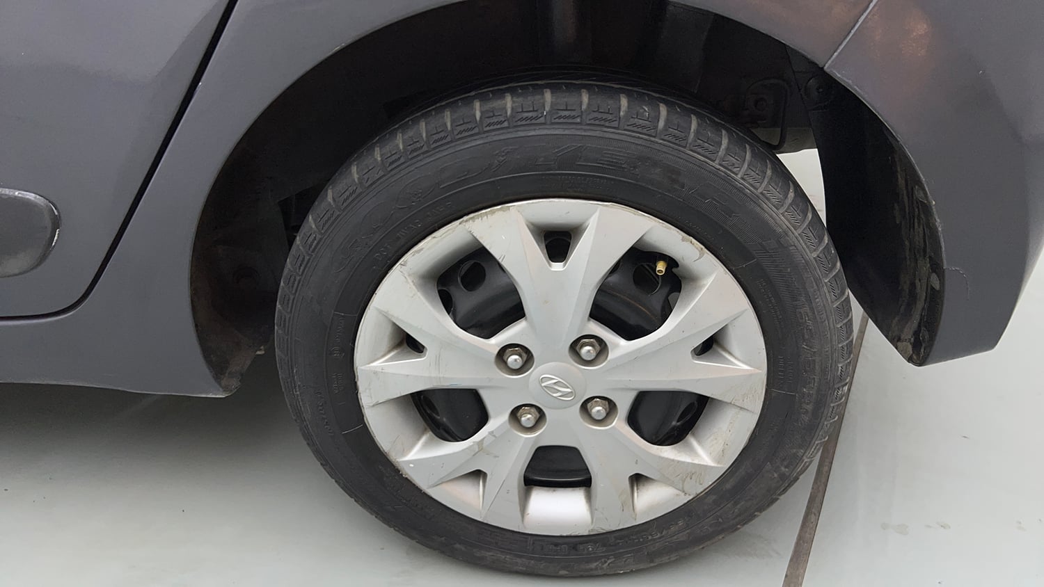 Used 2016 Hyundai Grand i10 Sportz 1.2 Kappa VTVT Petrol Manual tyres LEFT REAR TYRE RIM VIEW