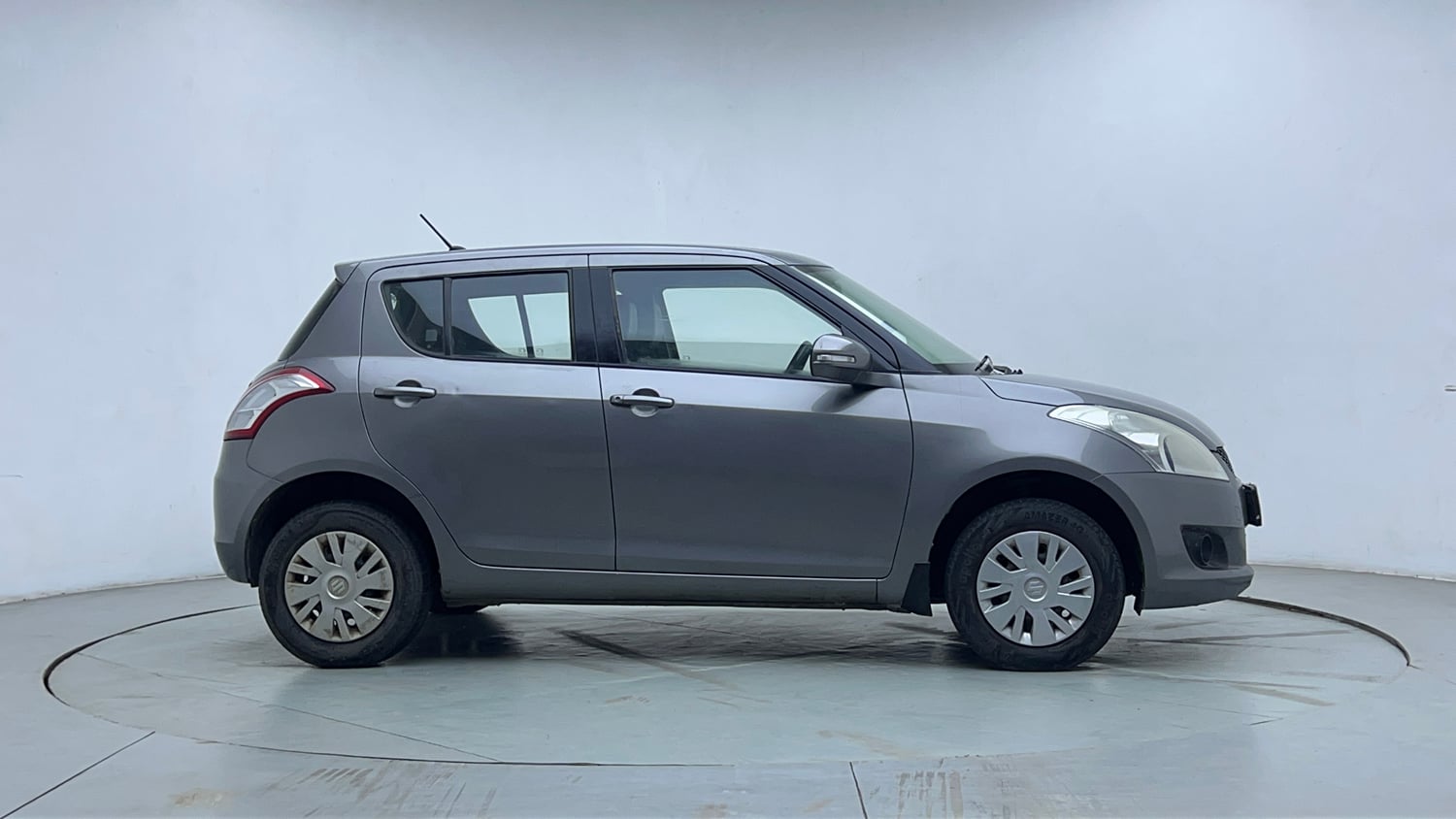 Used 2014 Maruti Suzuki Swift VXi Petrol Manual exterior RIGHT SIDE VIEW