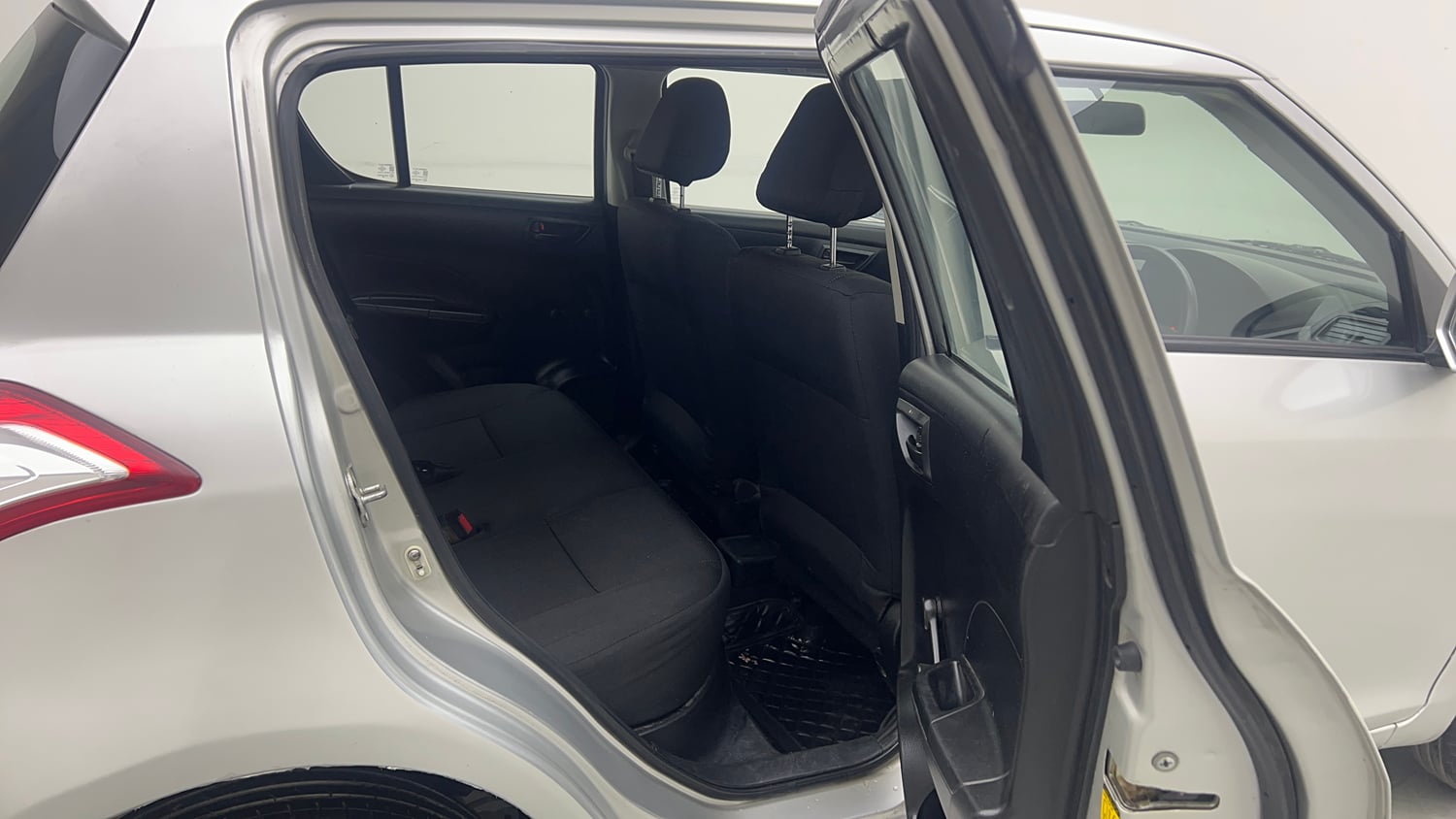 Used 2014 Maruti Suzuki Swift LXi Petrol Manual interior RIGHT SIDE REAR DOOR CABIN VIEW