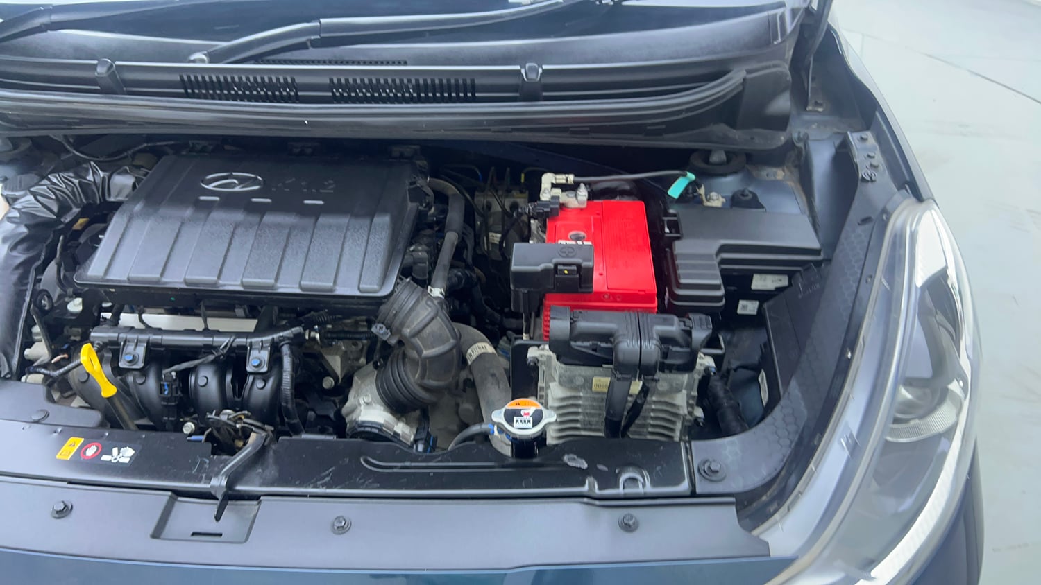 Used 2024 Hyundai Grand i10 Nios Sportz 1.2 Kappa AMT Petrol Automatic engine ENGINE LEFT SIDE VIEW