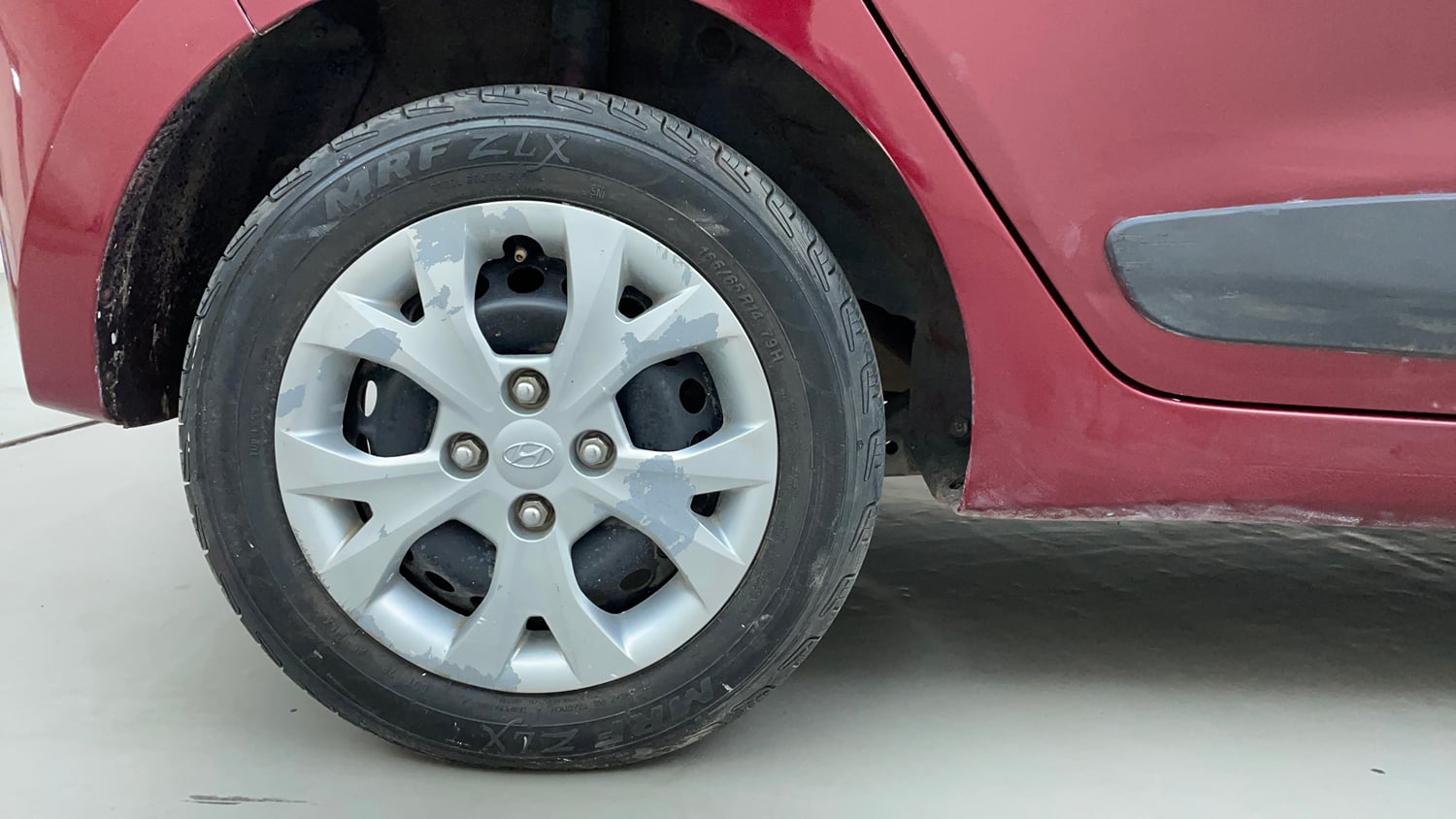 Used 2016 Hyundai Grand i10 Sportz 1.2 Kappa VTVT Petrol Manual tyres RIGHT REAR TYRE RIM VIEW